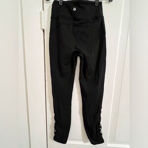 Lululemon leggings, women’s size 4, 25” inseam, cord and mesh bottom detail EUC